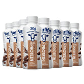 Shake Protéine Chocolat – bouteille crèmeuse, parfaite pour un petit-déjeuner rapide.