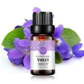 Huile essentielle violette Rainbow Abby dans une bouteille, idéale pour créer une ambiance aromatique.