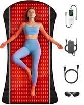 ROMISA matelas lumière rouge grand format sur canapé, relaxation musculaire à domicile.