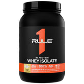 Rule 1 R1 Protein Whey Isolate dans sa boîte Banane Crème prête à déguster.
