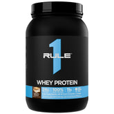 Rule 1 Proteins : boîte de protéine en poudre prête pour la récupération après entraînement.