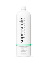Supersmile pré-rinçage: bouteille ouverte prête au pré-brossage.