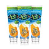 Tanner's Tasty Paste orange-tube: goût doux et sans menthe pour encourager le brossage des enfants.