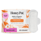 The Honey Pot Company serviettes avec ailes en coton biologique pour confort quotidien.