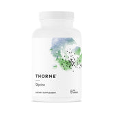 THORNE Glycine: bouteille de capsules, soutien potentiel au repos et à la récupération quotidienne.