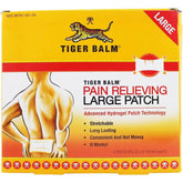 Pansement antidouleur Tiger Balm, grand format, 4 unités, pour soulager temporairement les tensions musculaires.