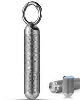 Porte-pilules TISUR en titane avec clef, léger et pratique.