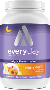 TransformHQ Nighttime Shake: bouteille avec gâteau ananas renversé, apport protéiné pour soirée.