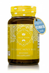 Capsules True Veda Basilic sacré près de la bouteille, soutien bien-être quotidien.