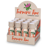 Turmeric Time Shot: bouteille claire avec gingembre, citron et miel pour énergie naturelle.