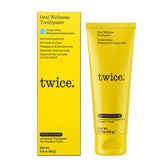 TWICE dentifrice anti-caries fluorure dans un emballage élégant, protection quotidienne.
