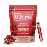 Ultima Replenisher poudre électrolytique cerise grenade pour hydratation équilibrée.