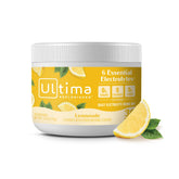 Ultima Replenisher poudre électrolyte citronnade dans son pot, hydratation pratique.