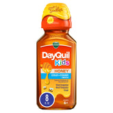Vicks DayQuil Enfants avec miel réel pour soulager toux et rhume.