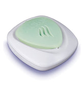 Vicks Vaporisateur menthol sans eau pour adultes sur table de chevet.