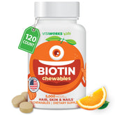 VitaWorks Kids Biotine, pastilles orange soutiennent potentiellement croissance cheveux et peau.