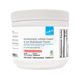 Xymogen ActivNutrients poudre Fruit Punch sur bouteille, prêt à être mélangé pour une boisson énergisante.