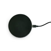 Chargeur sans fil Yogasleep avec Hushh+ sur plateau élégant et compact, recharge efficace.