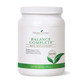 Balance Complete de Young Living — bouteille qui verse, énergie et vitalité immédiates pour démarrer la journée.