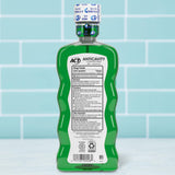 ACT Bain de bouche menthe avec doseur, précision du dosage pour chaque rinçage.