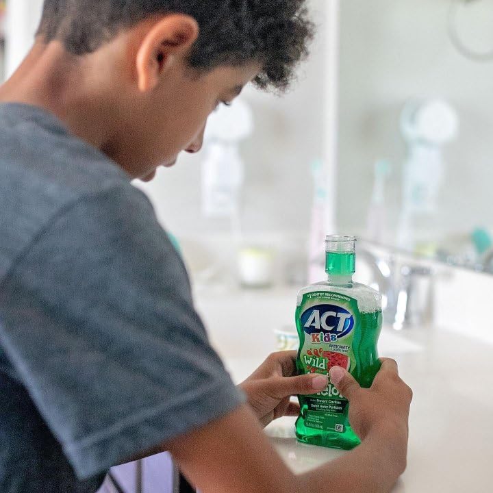 ACT Enfants Bain-bouche sans alcool pastèque avec gobelet doseur, pratique et sûr pour les jeunes