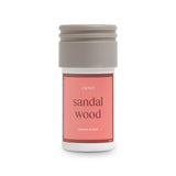 Flacon d'huile essentielle AERA Mini Santal pour ambiance apaisante à la maison.