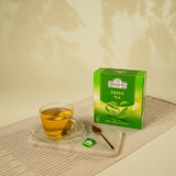 Ahmad Tea Thé Vert – feuilles vertes fraîches, dégustation naturelle et réconfortante.
