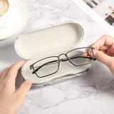 AITIME étui-lunettes-lentilles-marbre-02 texture marbrée et design élégant pour voyage.