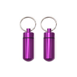 AKOAK flacon-pilules rond violet, étanche, idéal pour emporter des pilules en randonnée.