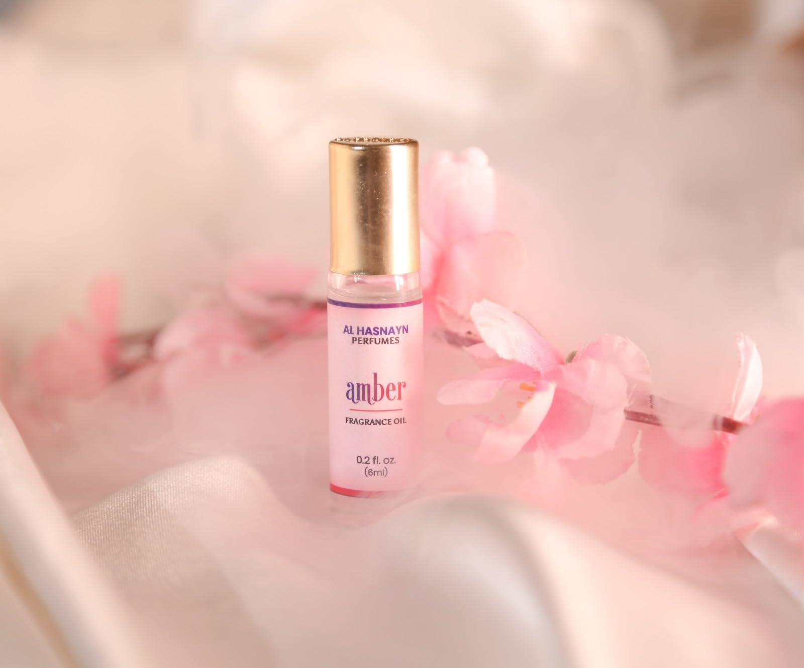 AL HASNAYN Amber Roll-On – Emballage élégant et pratique pour hommes et femmes.