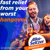 Comprimés Alka-Seltzer dans eau pétillante orange