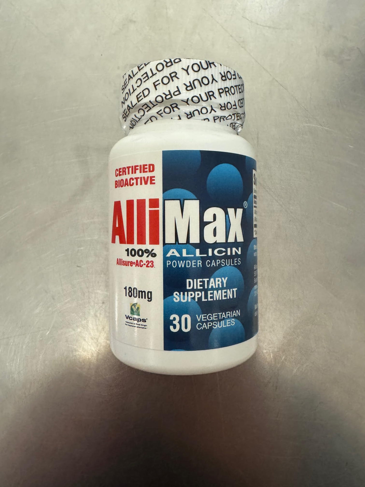 Allimax 180 mg, bouteille de gélules, format pratique pour l'utilisation quotidienne.