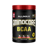 ALLMAX AMINOCORE dans le pot montrant le mélange BCAA clair et ciblé pour la récupération musculaire.