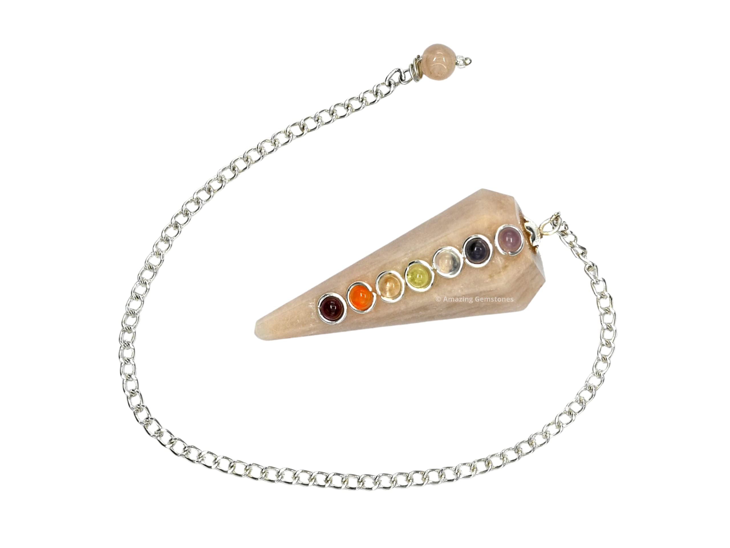 Amazing Gemstone facettes hexagonales du pendule captant la lumière pour les lectures intuitives.