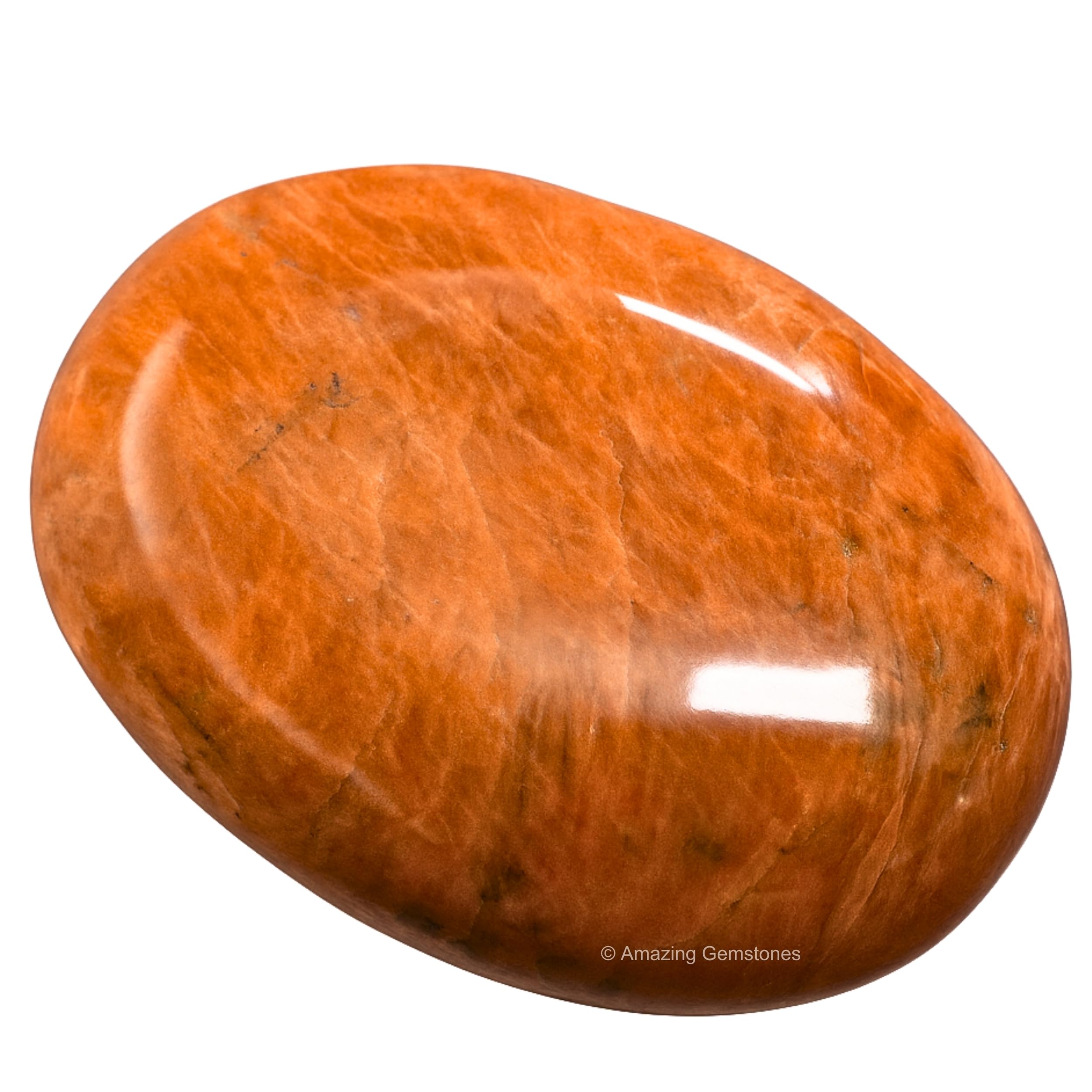 Amazing Gemstone pierre-lune-peche-gros-plan, révèle les reflets délicats et la couleur pêche.