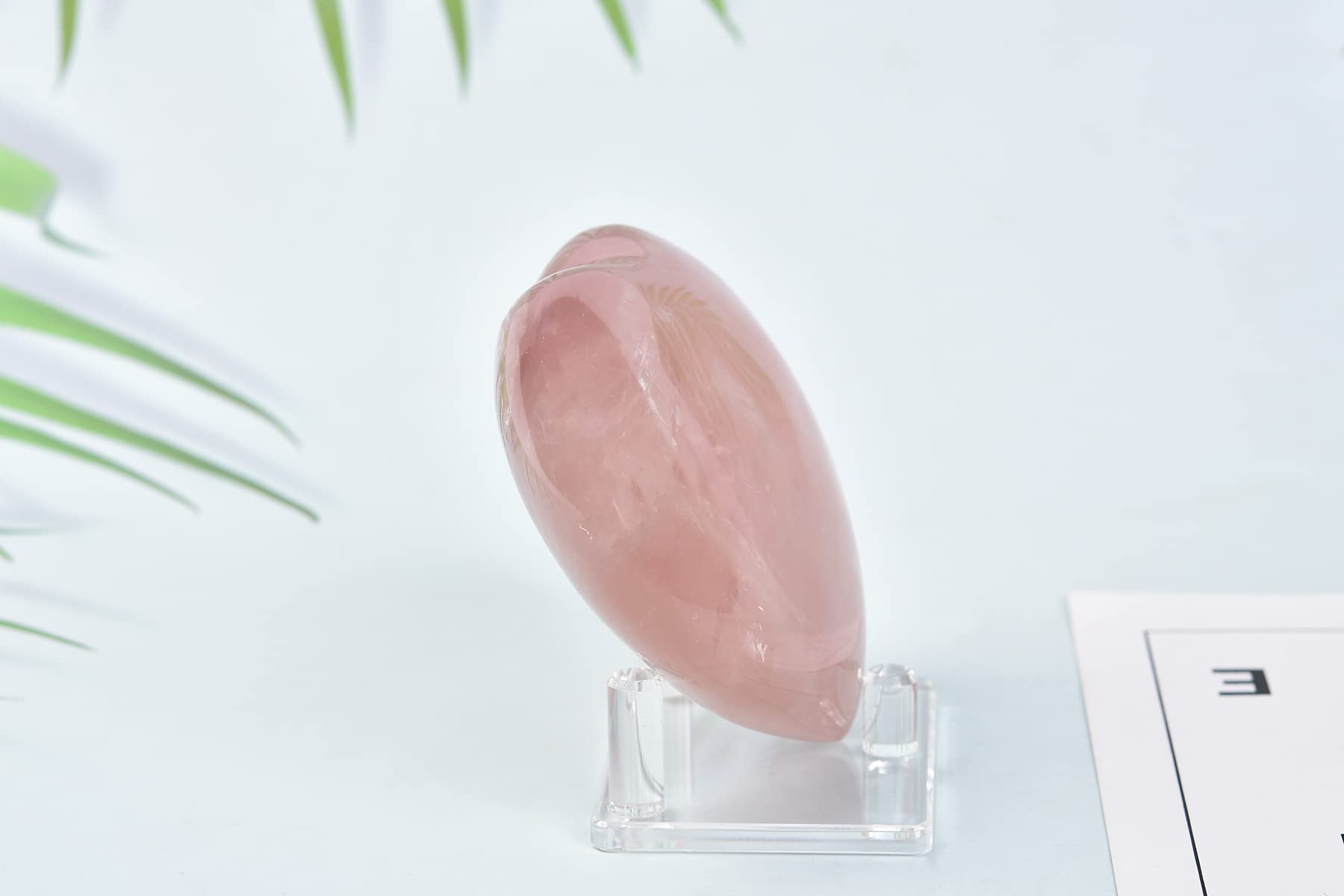 AMOYSTONE Cœur quartz rose favorisant harmonie et énergie douce.