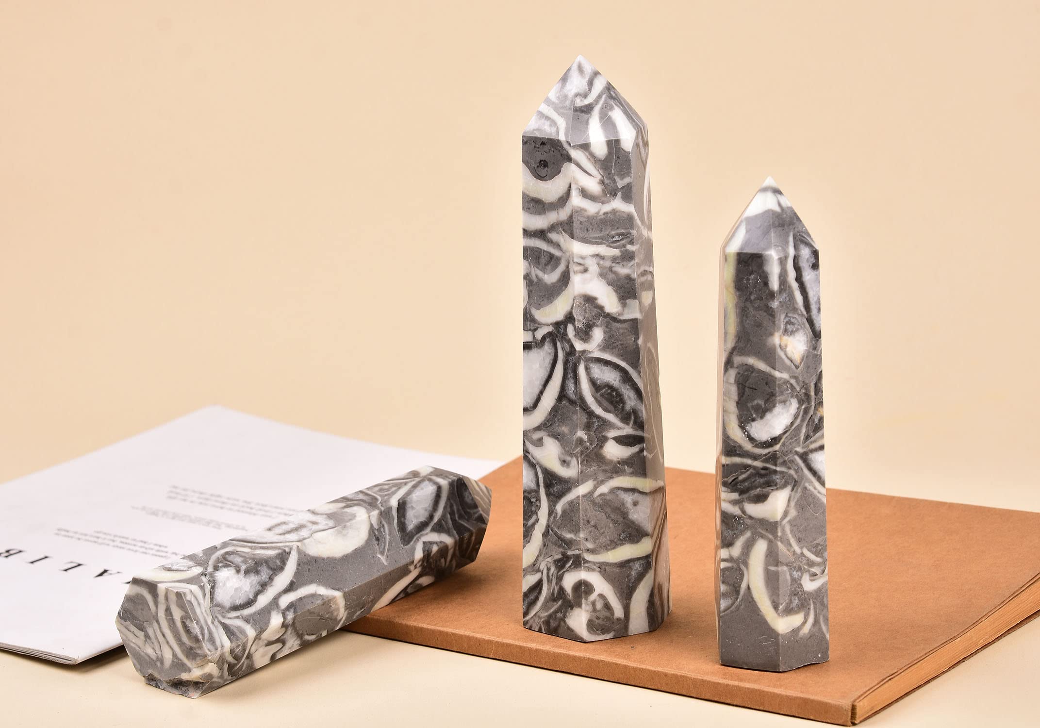 AMOYSTONE emballage et garantie, obélisque jaspe mille yeux gris.
