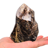 AMOYSTONE Lune Noire Tour Flamme: énergie concentrée pour votre espace intérieur.