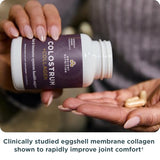 Capsules blanches d’Ancient Nutrition Colostrum Superfood + Collagen, faciles à prendre le matin.