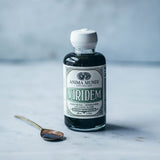 Cuillère doseuse fournie, utilisation simple et précise pour la routine.