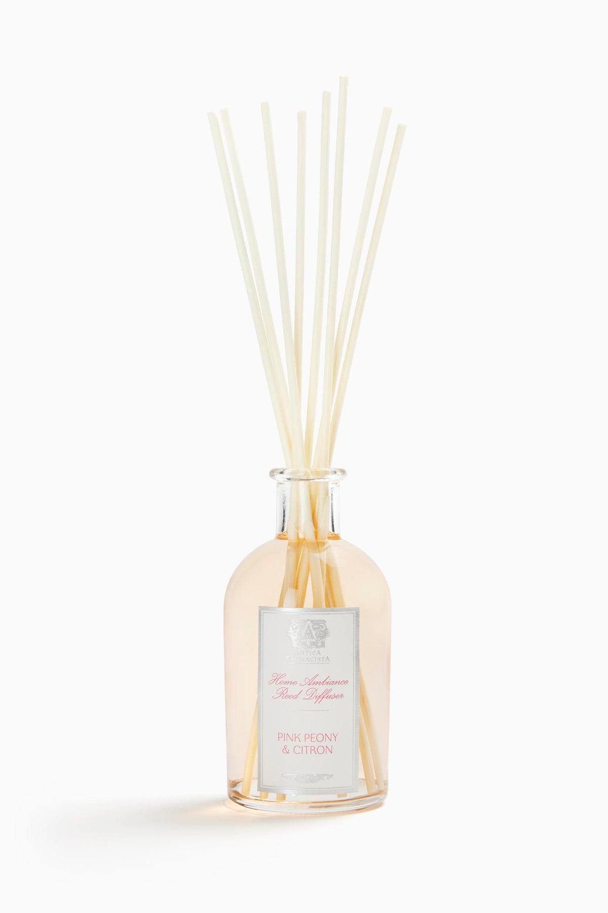 Diffuseur d'ambiance Antica Farmacista avec roseaux, parfum durable et élégant pour votre salon.