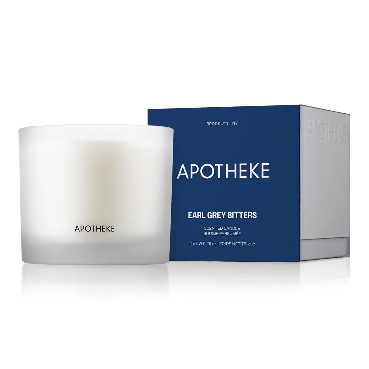 Bougie APOTHEKE Earl Grey Bitters à trois mèches pour le salon.