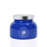 Bougie Aroma Bay Ozone dans un verre bleu, ambiance maritime et frais, pour rafraîchir une pièce.