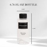Flacon Aroma360 et notes coco miel pour ambiance tropicale chaleureuse.