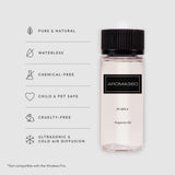 Aroma360 Pourpre: diffuseur en action dans un salon élégant.