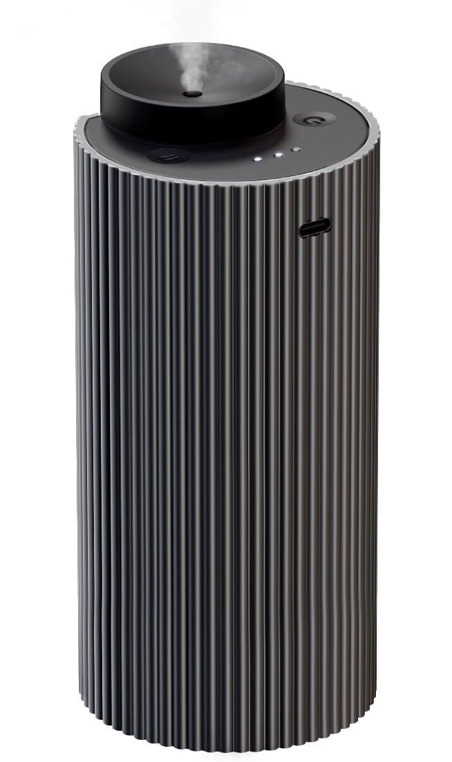 Aromadd diffuseur intelligent, corps aluminium gris, diffusion élégante dans un intérieur moderne.