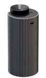 Aromadd diffuseur intelligent, corps aluminium gris, diffusion élégante dans un intérieur moderne.