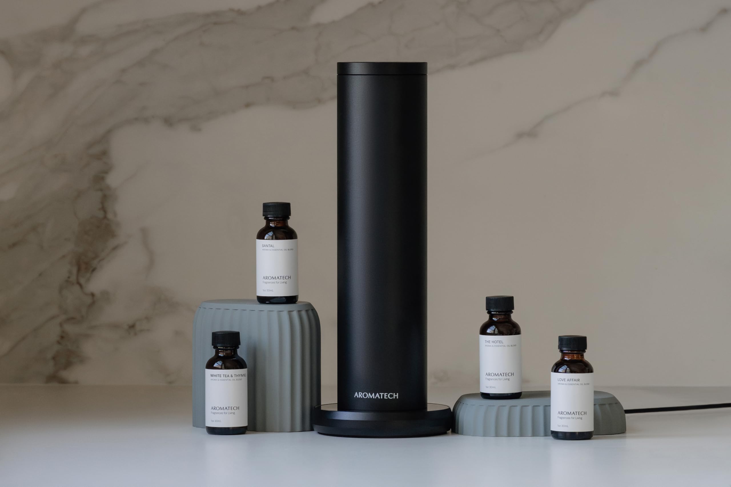 Installation facile du diffuseur AroMini BT Plus dans un espace professionnel.