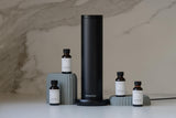 Installation facile du diffuseur AroMini BT Plus dans un espace professionnel.