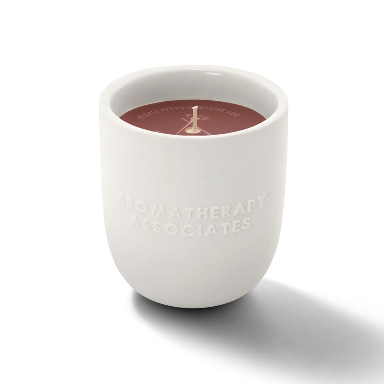 Bougie Rose d'Aromatherapy Associates, mèche coton durable – lumière douce et durable.